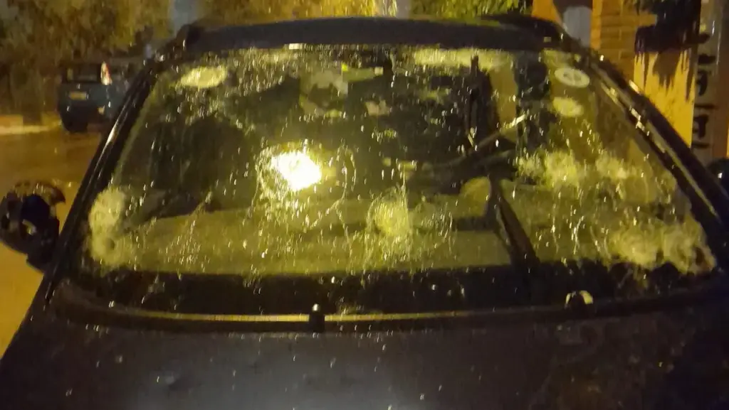A car damaged by hail