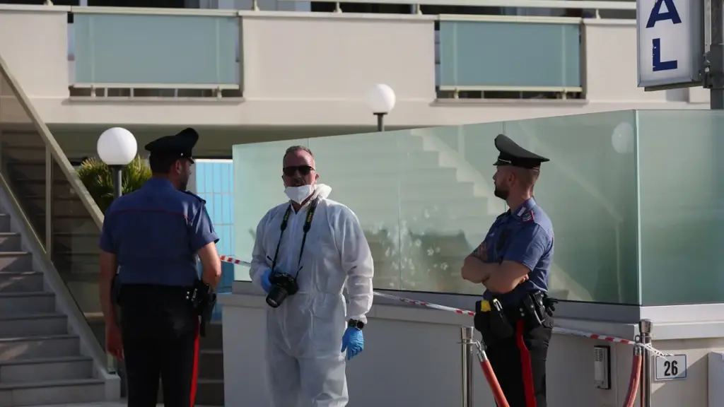 Investigators at the scene of the tragedy