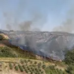 Thunderstorm with hail 'helps' to extinguish the fire: the flames had put houses at risk, a resident